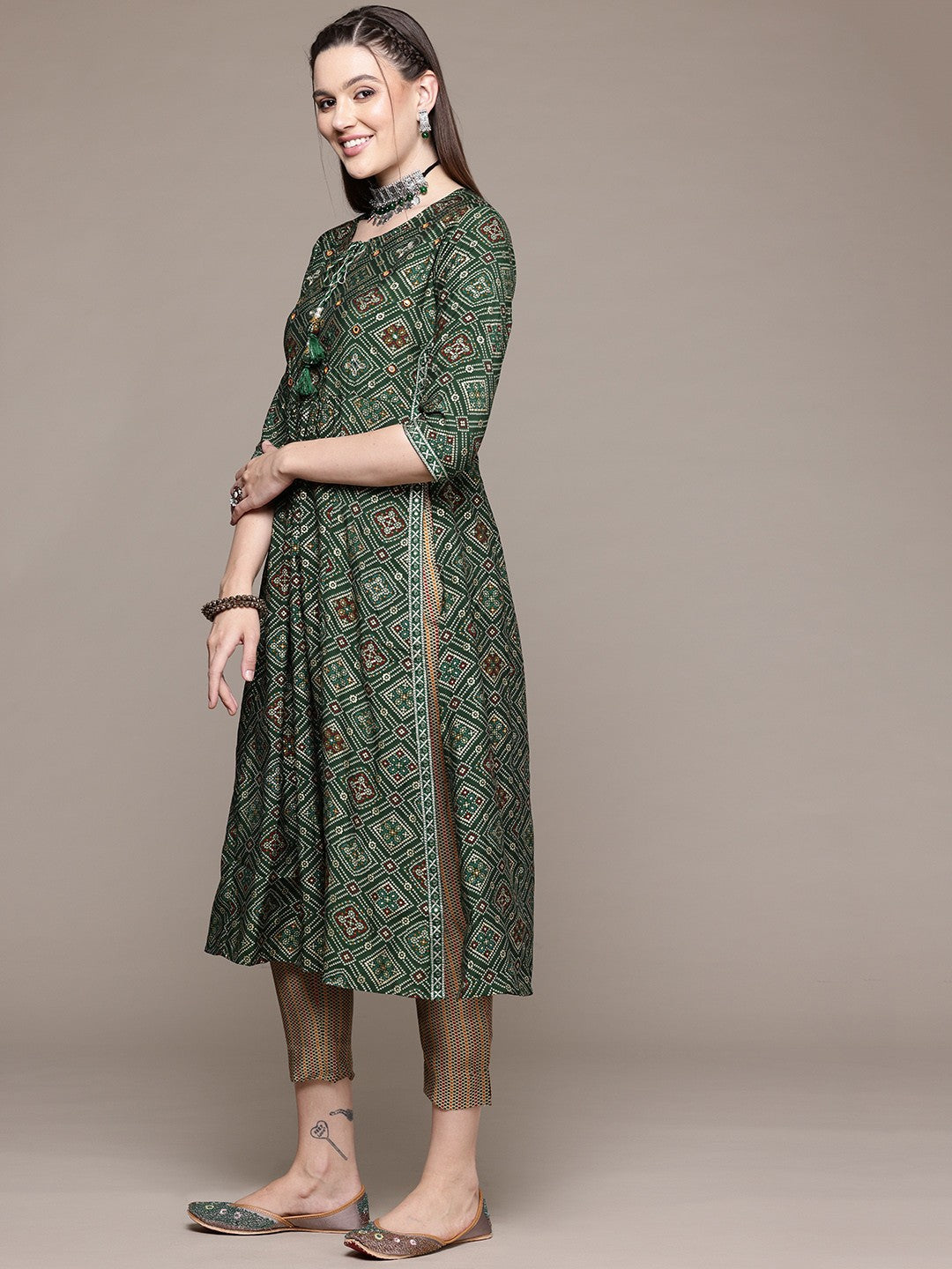 Flared Style Silk Fabric Green Color Kurta With Bottom