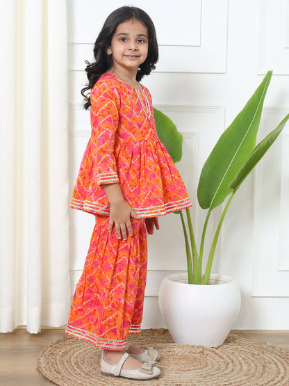 Girls Frock Style Cotton Fabric Orange Color Bandhej Kurti And Sharara With Gotta Lace Work