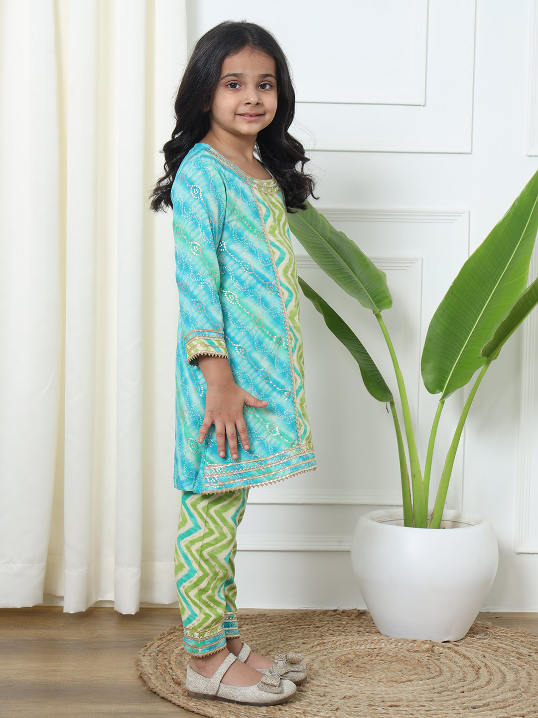 A Line Style Rayon Fabric Blue And Green Color Printed Kurti And Pyjama With Gotta Lace Work