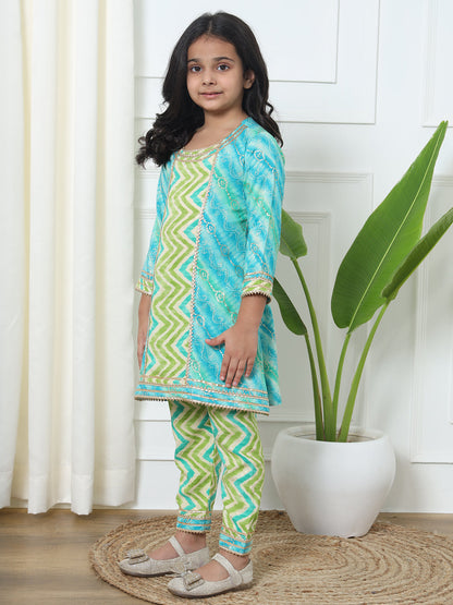 A Line Style Rayon Fabric Blue And Green Color Printed Kurti And Pyjama With Gotta Lace Work