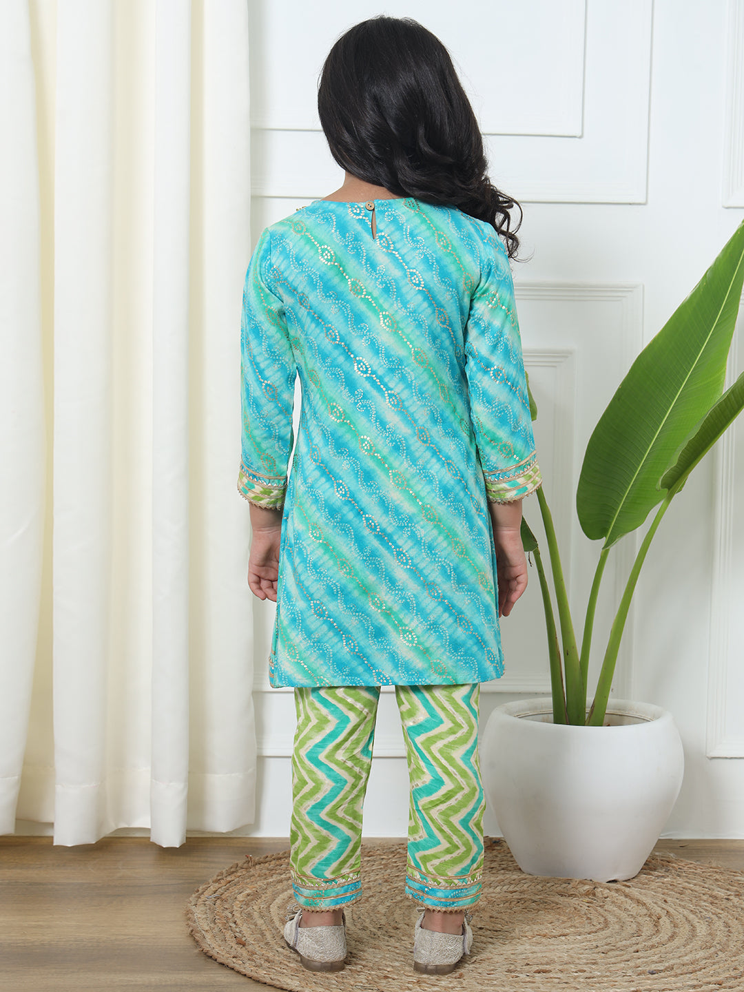 A Line Style Rayon Fabric Blue And Green Color Printed Kurti And Pyjama With Gotta Lace Work