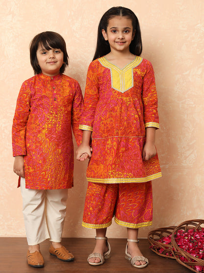 Girls Tiered Style Cotton Fabric Pink Color Printed Kurti And Sharara With Gotta Lace Work