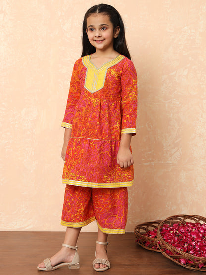 Girls Tiered Style Cotton Fabric Pink Color Printed Kurti And Sharara With Gotta Lace Work