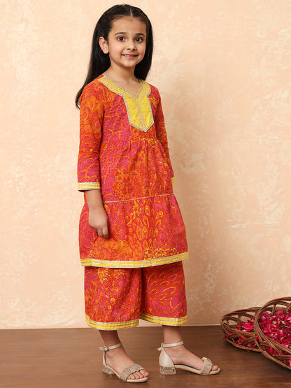 Girls Tiered Style Cotton Fabric Pink Color Printed Kurti And Sharara With Gotta Lace Work
