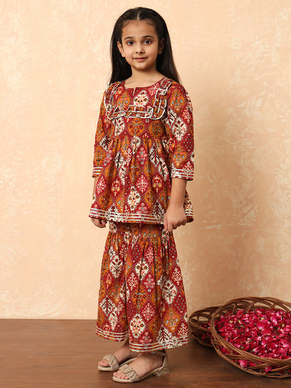 Girls Frock Style Cotton Fabric Maroon Color Floral Printed Kurti And Sharara With Gotta Lace Work