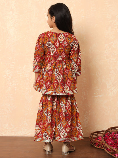 Girls Frock Style Cotton Fabric Maroon Color Floral Printed Kurti And Sharara With Gotta Lace Work