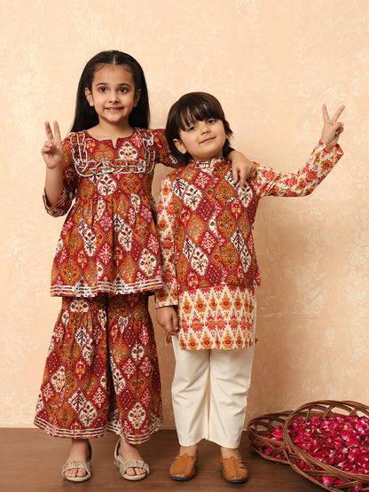 Girls Frock Style Cotton Fabric Maroon Color Floral Printed Kurti And Sharara With Gotta Lace Work