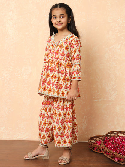 Girls Frock Style Cotton Fabric Cream Color Printed Kurti And Sharara With Gotta Lace Work