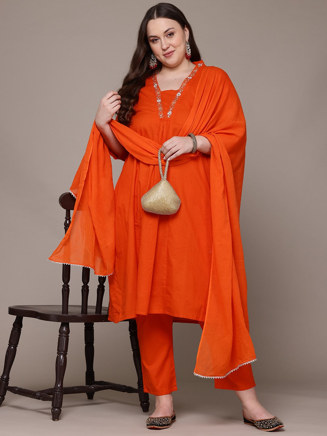 A Line Style Cotton Fabric Orange Colour Kurta With Bottom And Dupatta