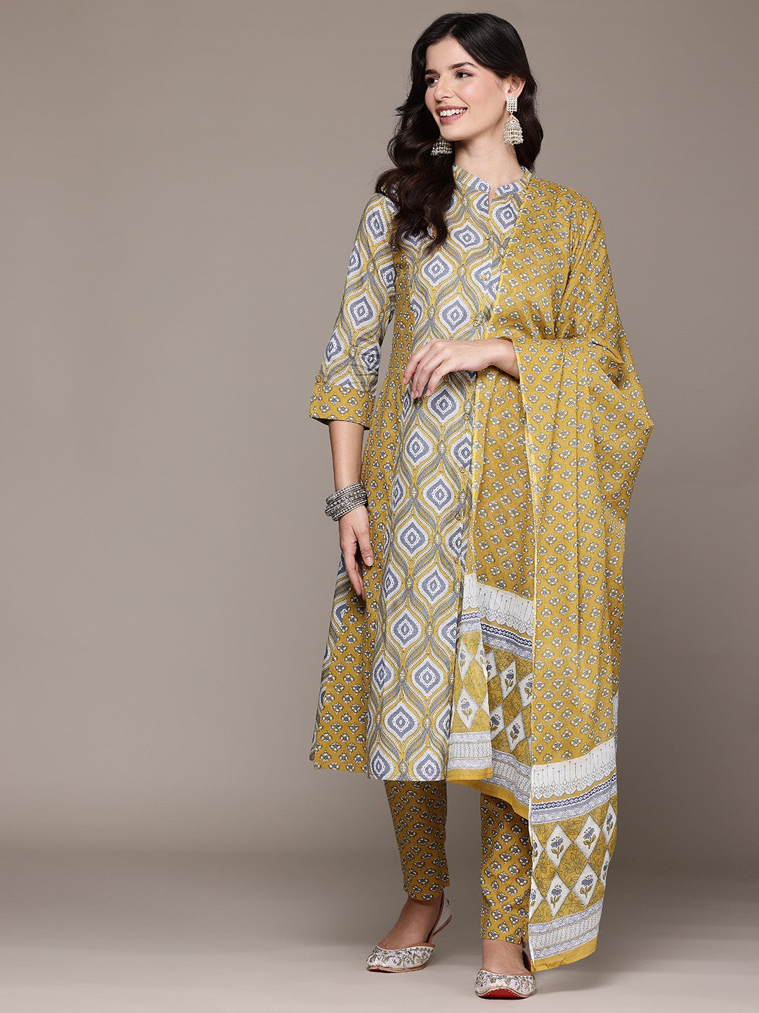 A Line Style Cotton Fabric Mustard Color Kurta And Bottom With Dupatta