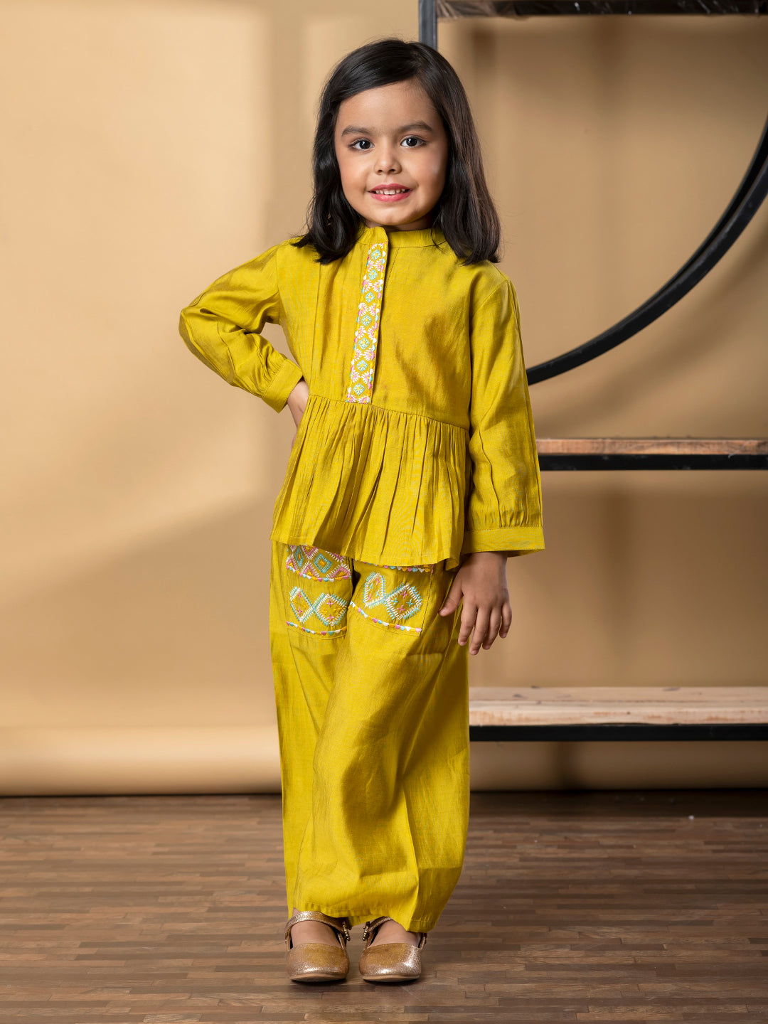 Girls Peplum Style Roman Silk Fabric Gold Color Kurti With Palazzo