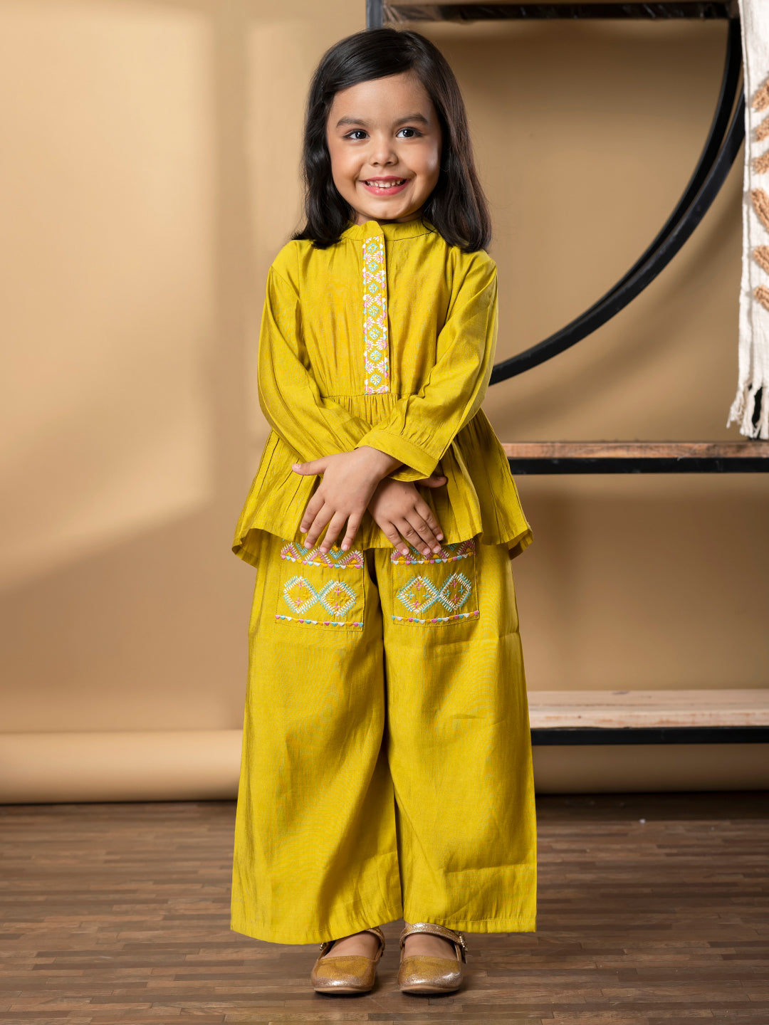 Girls Peplum Style Roman Silk Fabric Gold Color Kurti With Palazzo