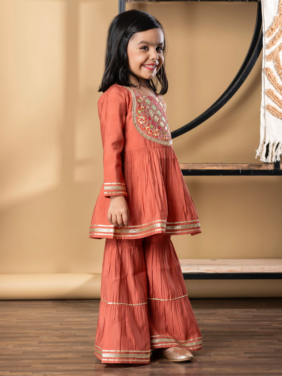 Girls Peplum Style Roman Silk Fabric Peach Color Kurti With Sharara