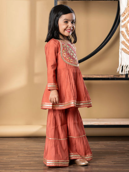 Girls Peplum Style Roman Silk Fabric Peach Color Kurti With Sharara