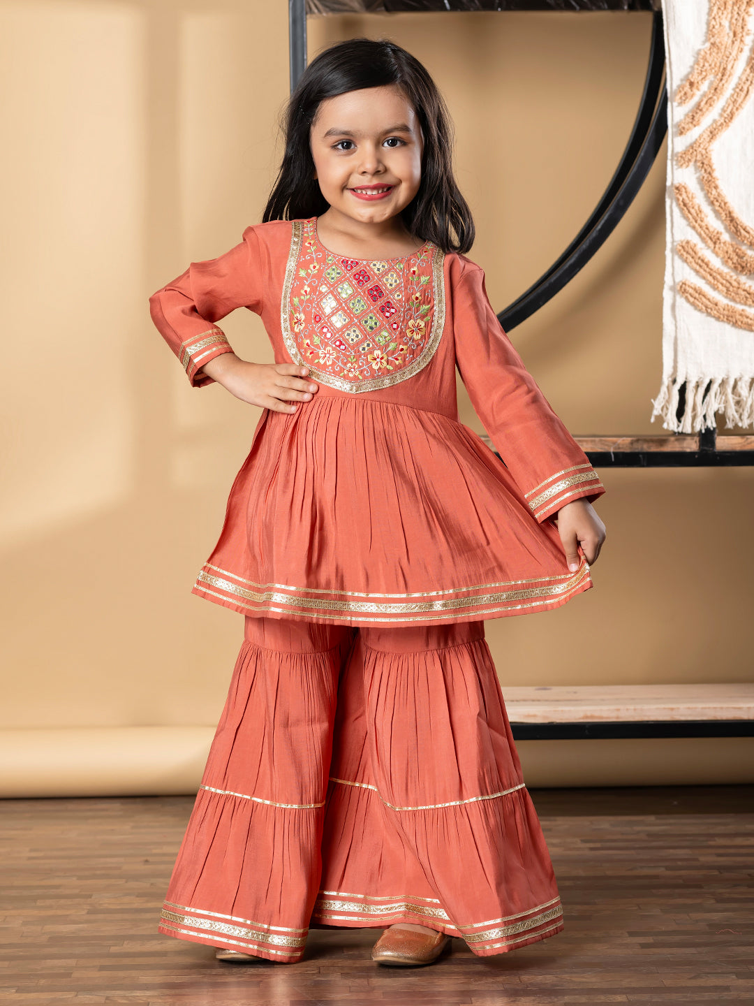 Girls Peplum Style Roman Silk Fabric Peach Color Kurti With Sharara