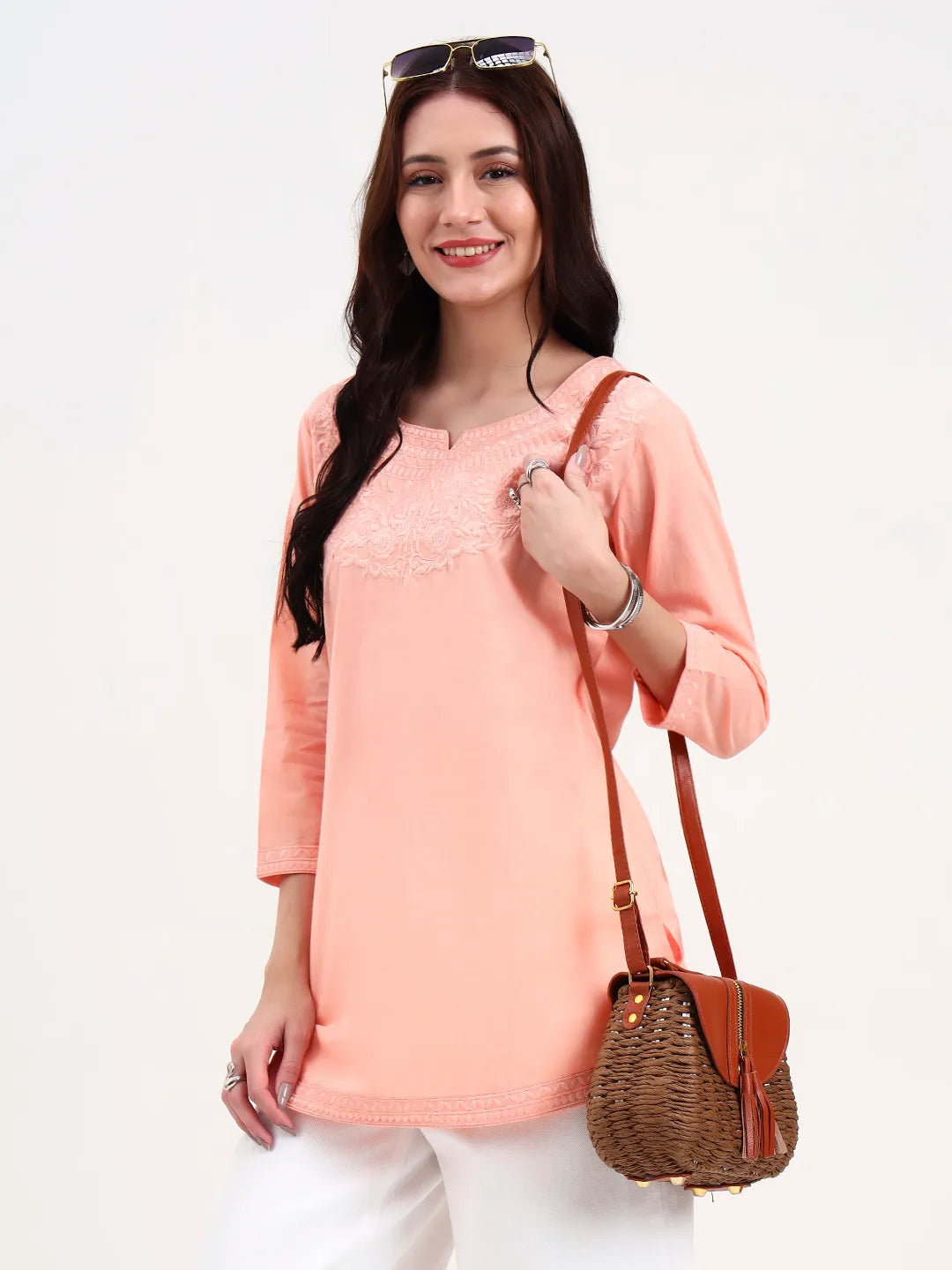 Women's Peach Cotton Peach Cotton Straight Peplum Top by Yufta, suitable for wholesale buyers, boutiques, retailers, resellers and bulk fashion orders from Trendphoria