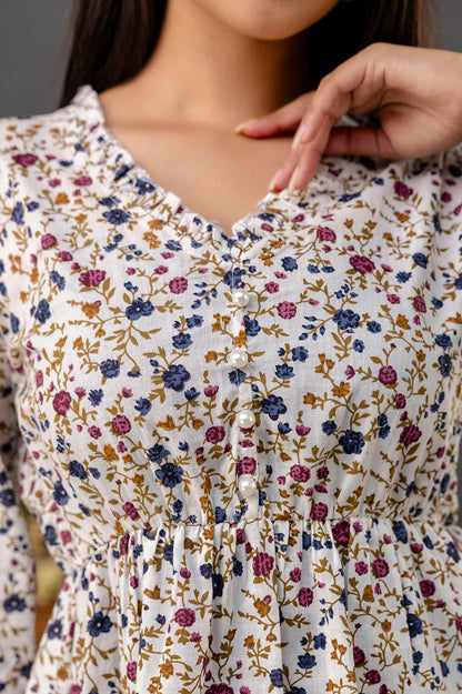 Off White Printed V-Neck Peplum Tunic