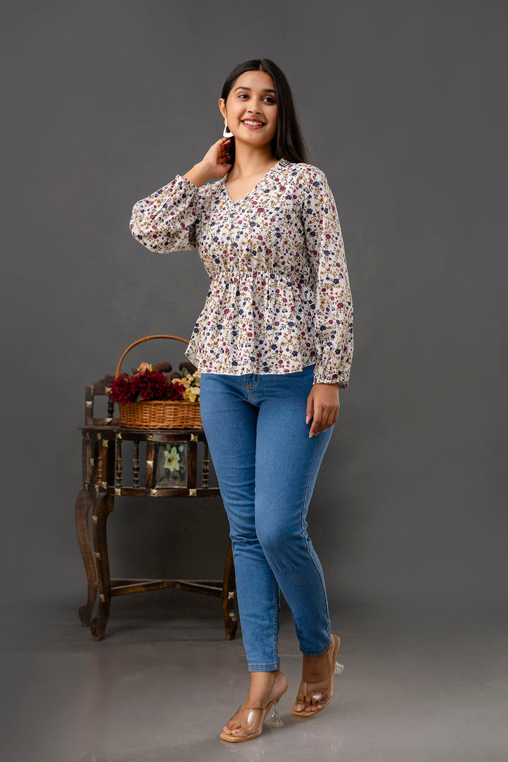 Off White Printed V-Neck Peplum Tunic