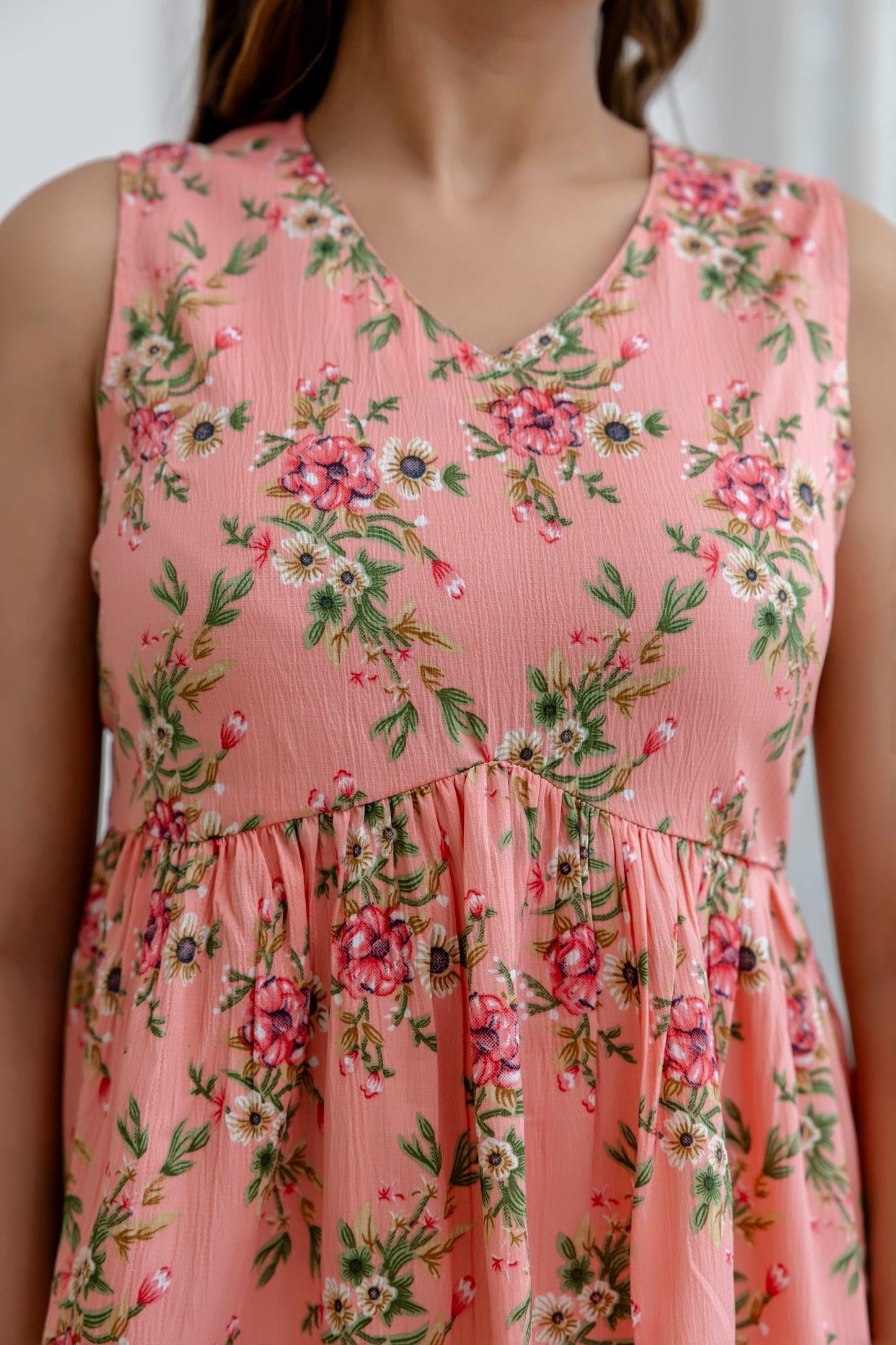 Peach Printed Peplum Tunic