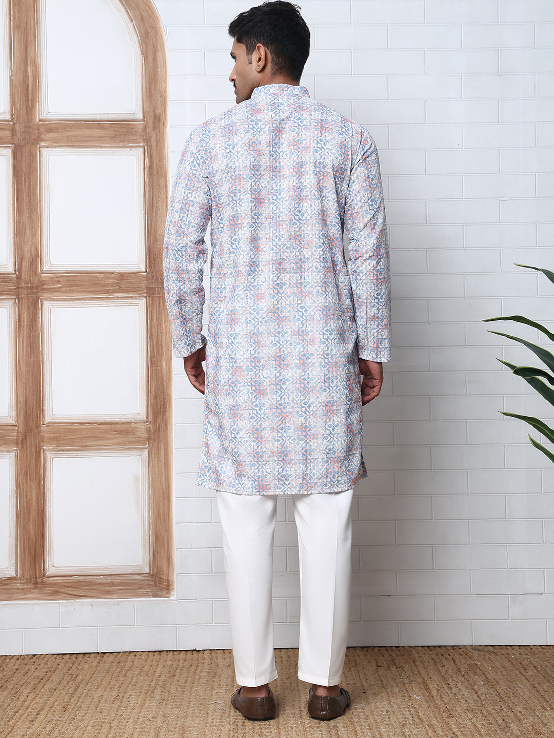 Printed And Embroidered Kurta Pyjama Set.