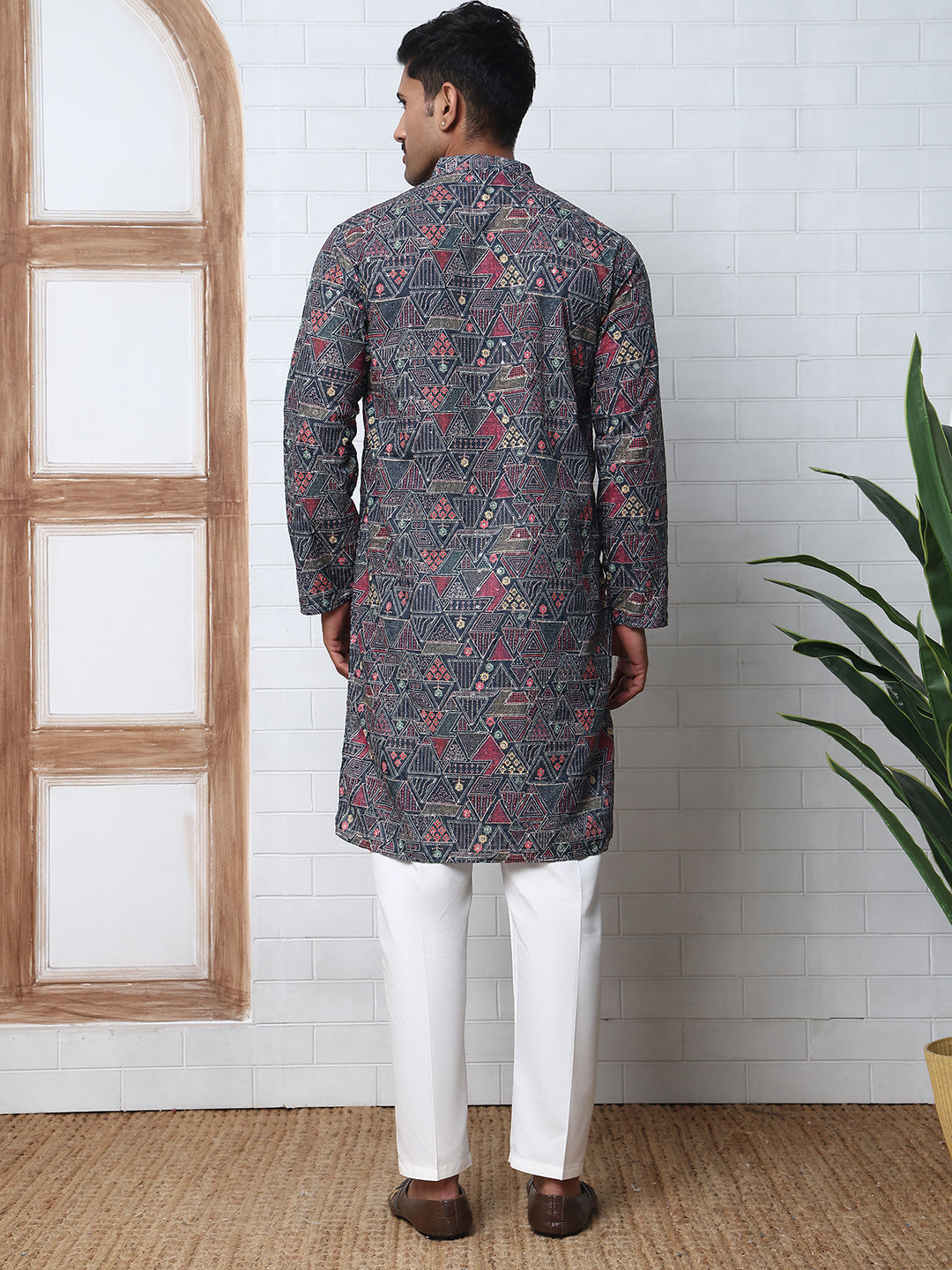 Printed And Embroidered Kurta Pyjama Set.