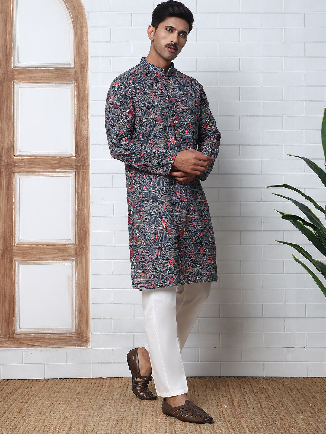 Printed And Embroidered Kurta Pyjama Set.