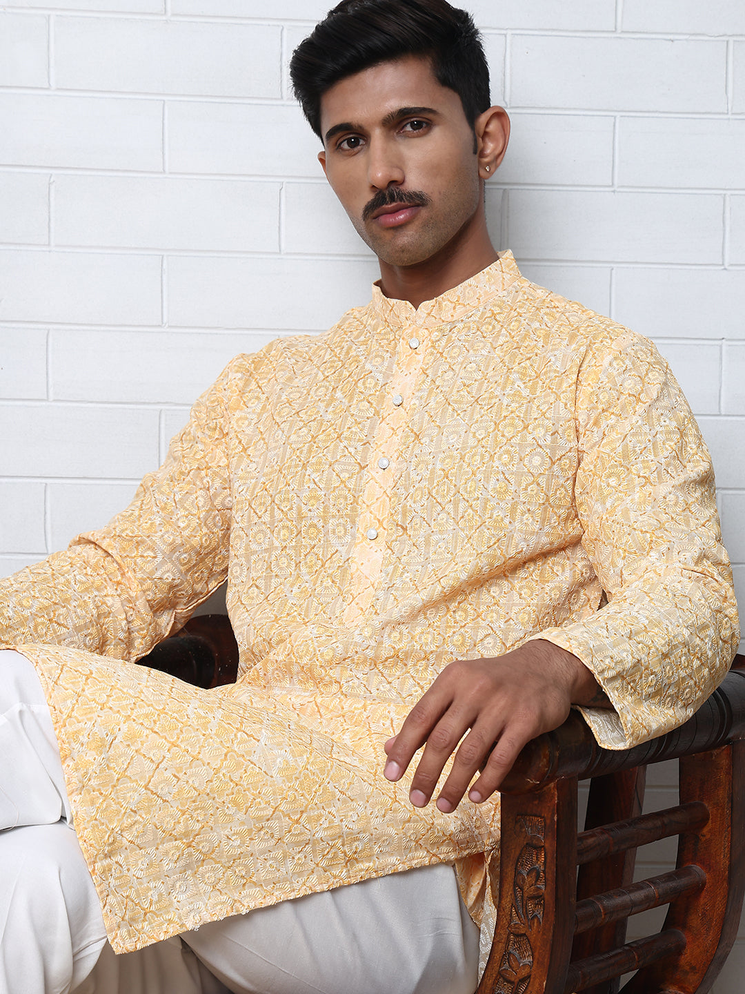 Printed And Embroidered Kurta Pyjama Set.