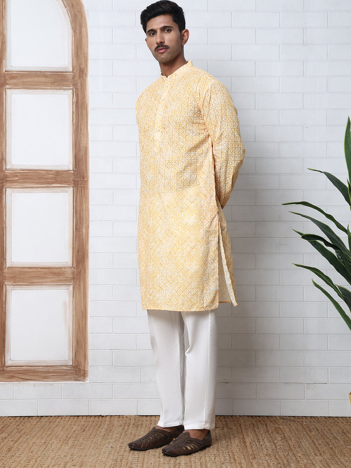 Printed And Embroidered Kurta Pyjama Set.