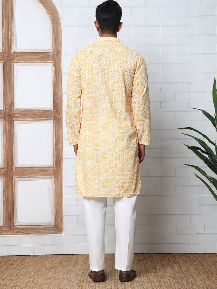 Printed And Embroidered Kurta Pyjama Set.