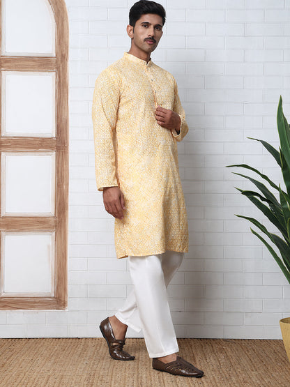 Printed And Embroidered Kurta Pyjama Set.