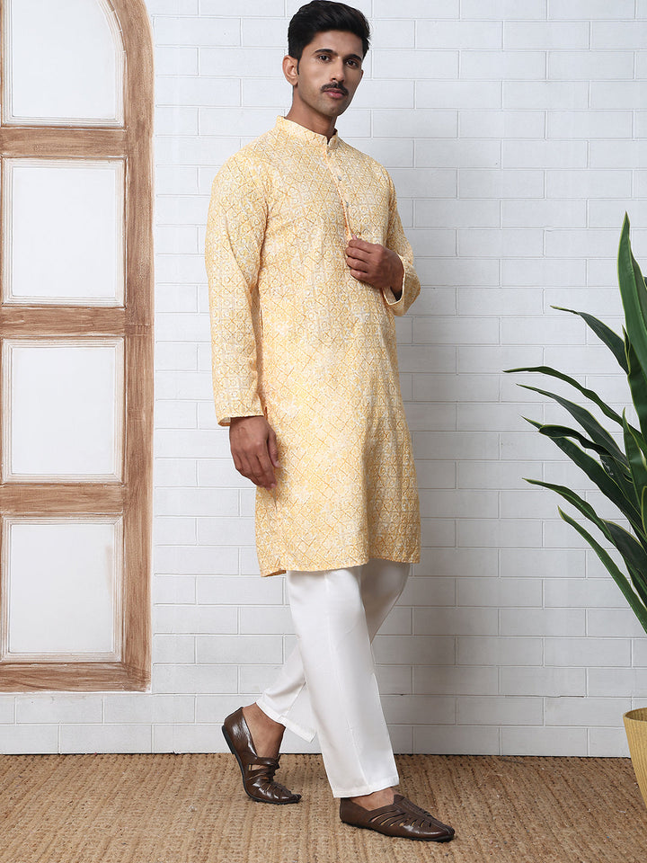 Printed And Embroidered Kurta Pyjama Set.