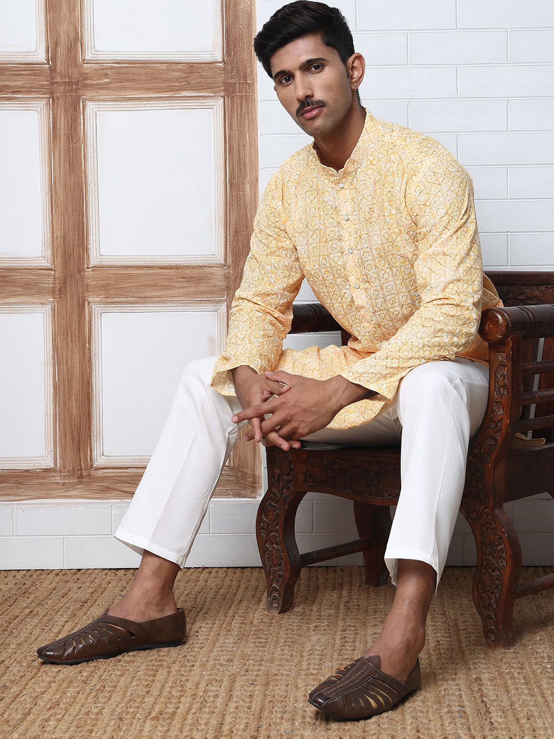 Printed And Embroidered Kurta Pyjama Set.