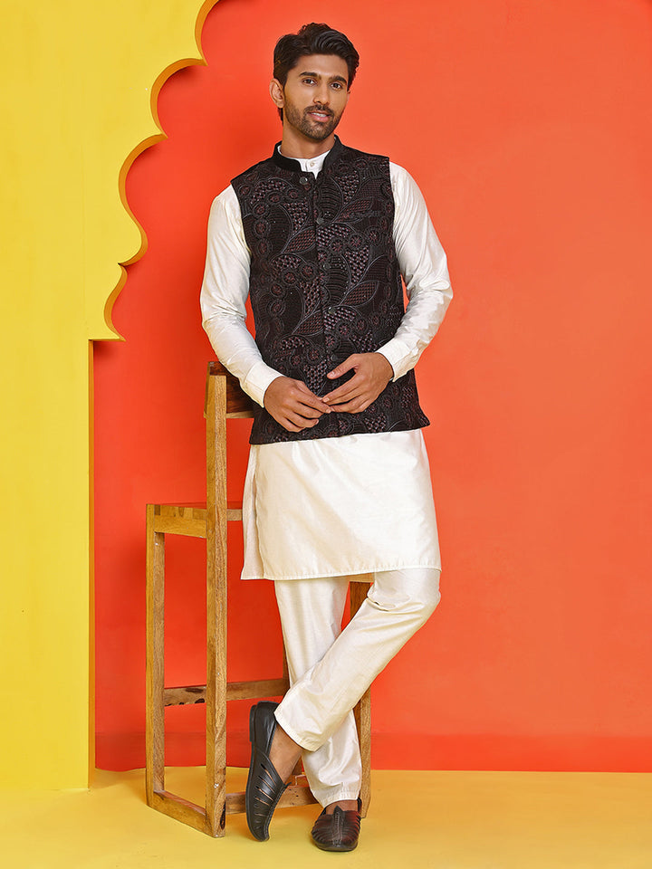 Embroidered Velvet Nehru Jacket With Solid Kurta Pyjama.