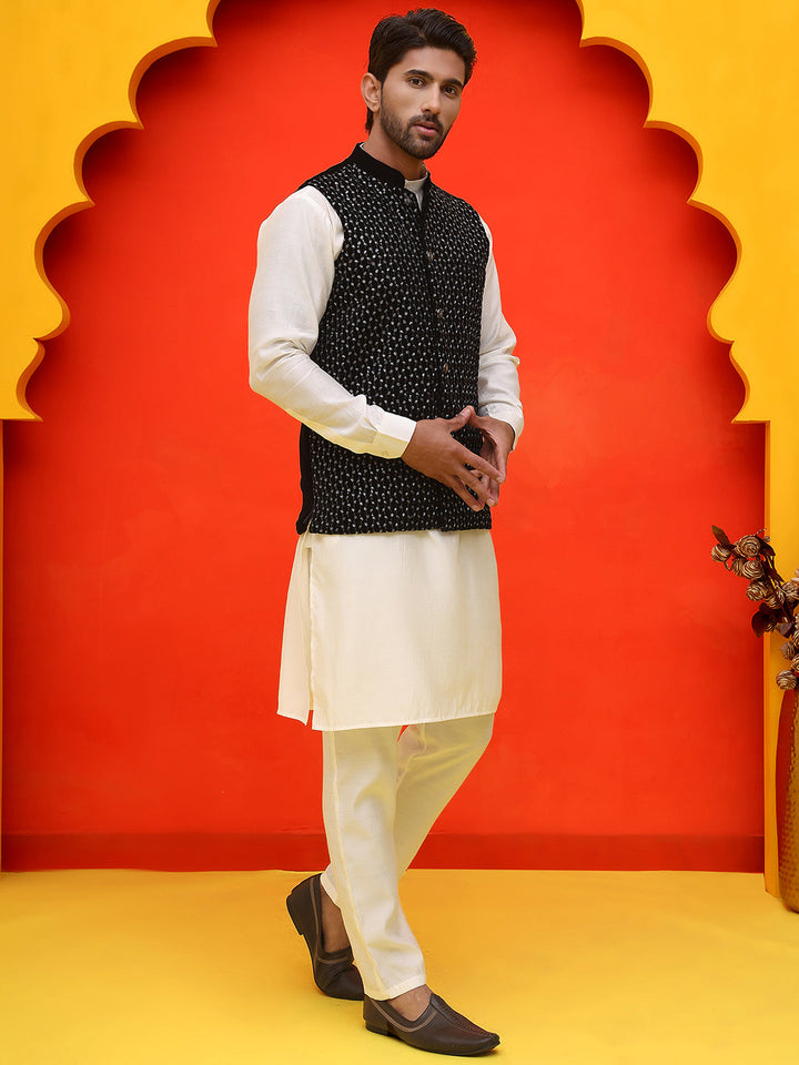 Embroidered Velvet Nehru Jacket With Solid Kurta Pyjama.