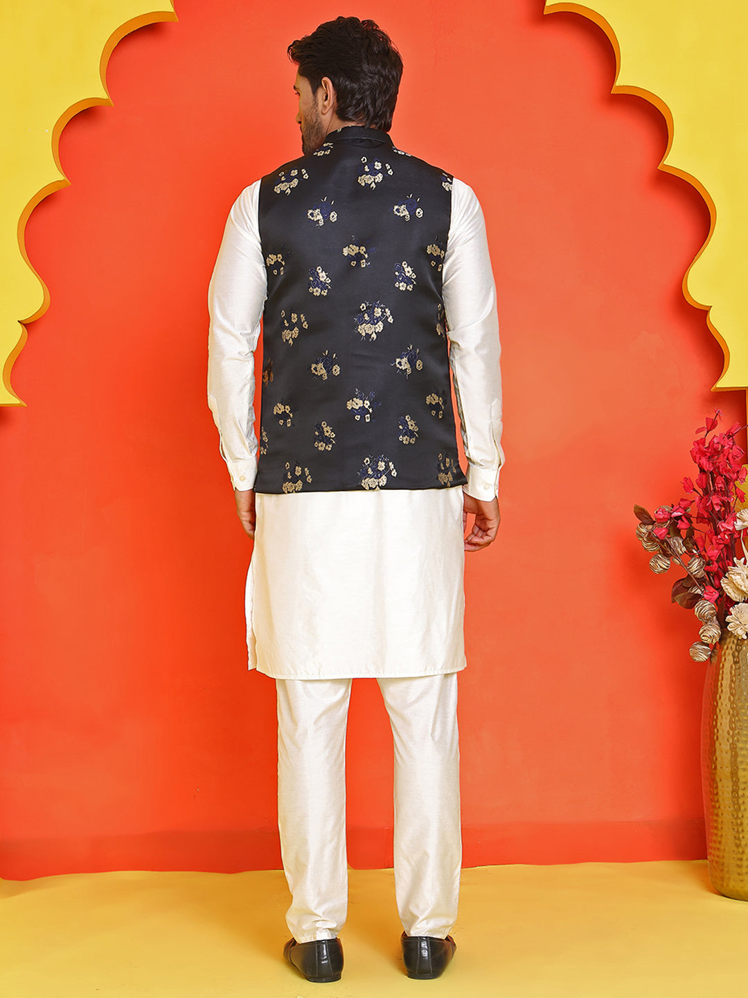 Embossed  Nehru Jacket With Solid Kurta Pyjama.
