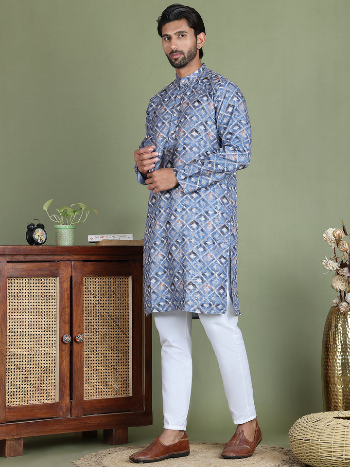 Embroidered And Printed Cotton Blend Kurta Pyjama.