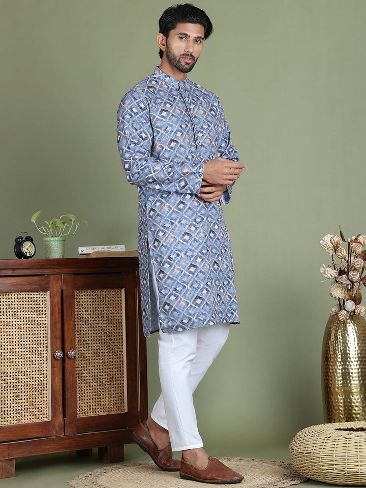 Embroidered And Printed Cotton Blend Kurta Pyjama.