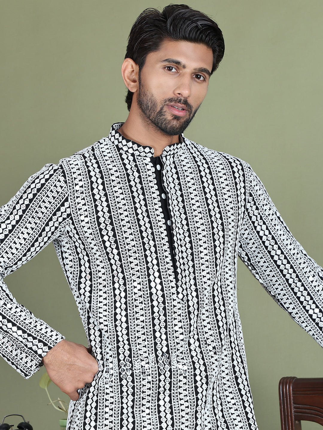 Embroidered And Mirror Work Kurta Pyjama Sets.