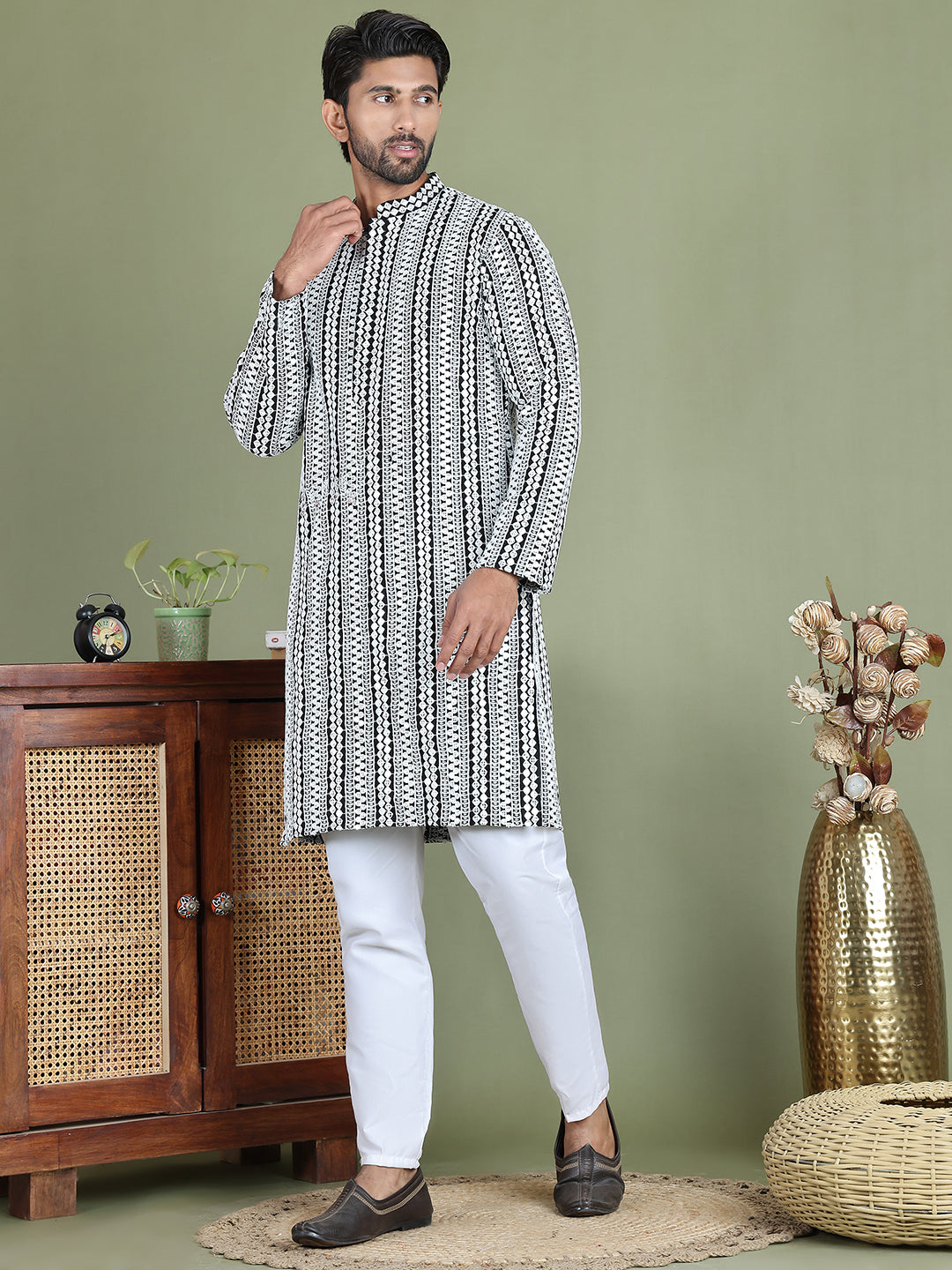 Embroidered And Mirror Work Kurta Pyjama Sets.