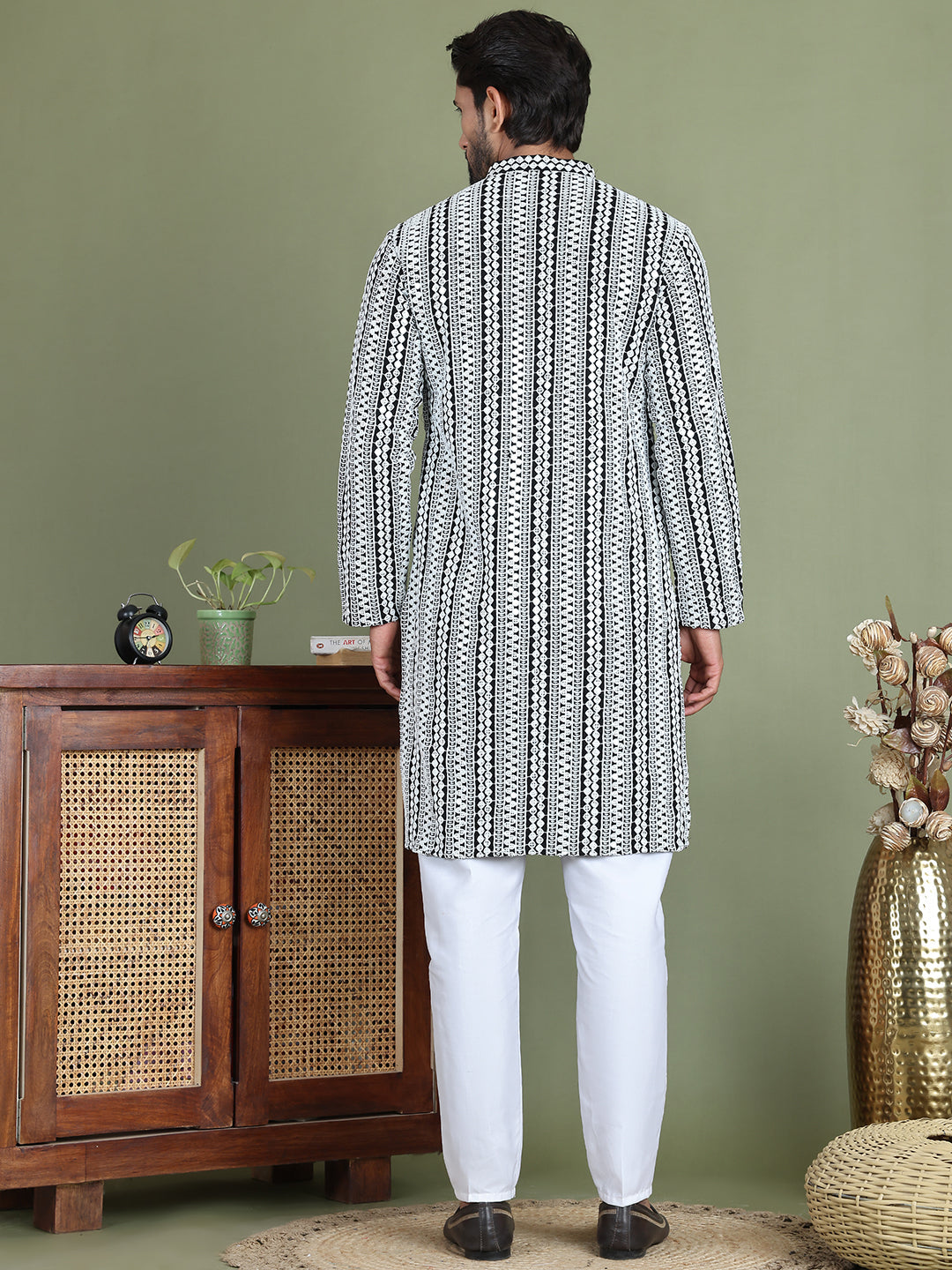 Embroidered And Mirror Work Kurta Pyjama Sets.
