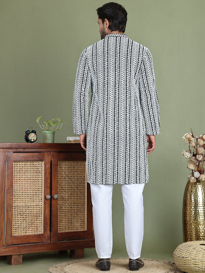 Embroidered And Mirror Work Kurta Pyjama Sets.