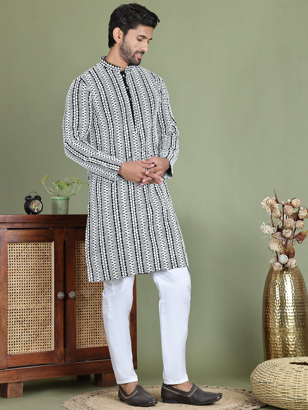 Embroidered And Mirror Work Kurta Pyjama Sets.