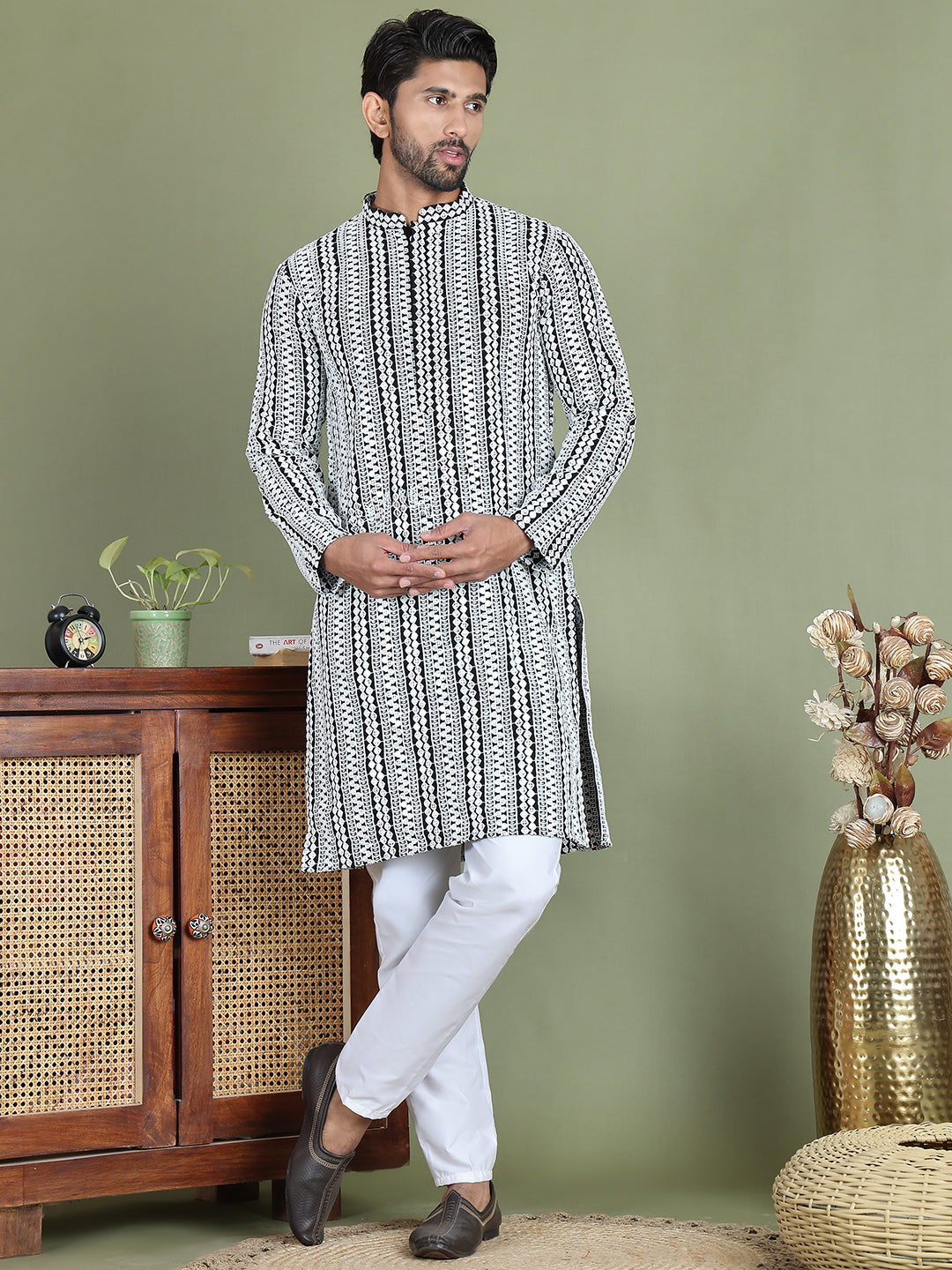 Embroidered And Mirror Work Kurta Pyjama Sets.