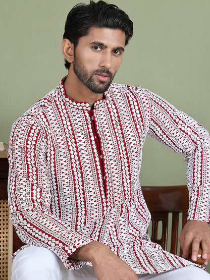 Embroidered And Mirror Work Kurta Pyjama Sets.