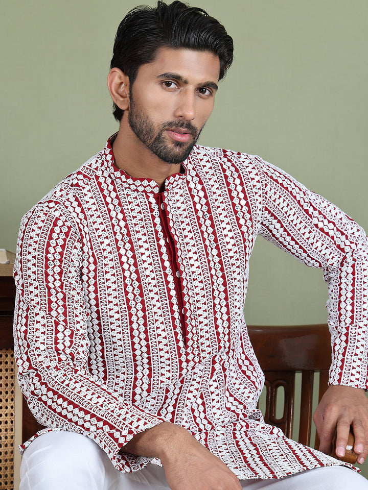 Embroidered And Mirror Work Kurta Pyjama Sets.
