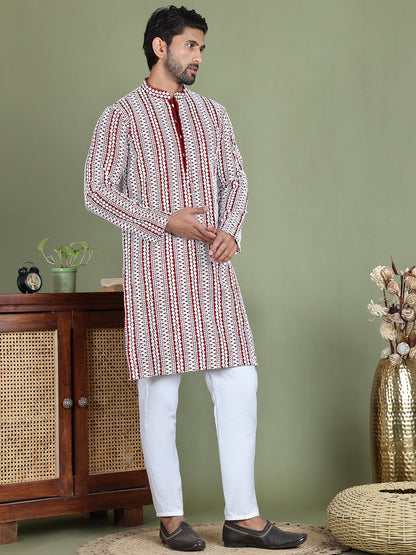 Embroidered And Mirror Work Kurta Pyjama Sets.