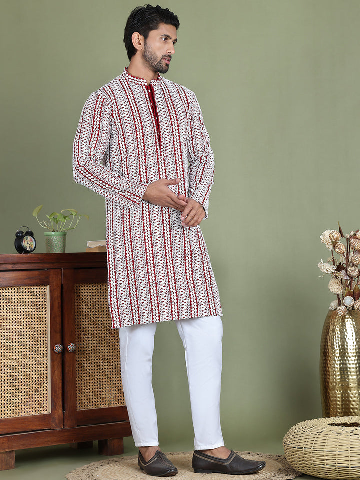 Embroidered And Mirror Work Kurta Pyjama Sets.
