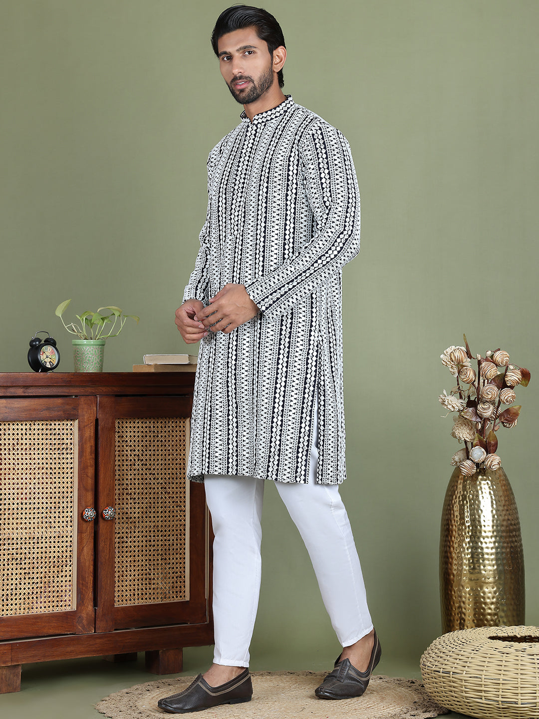 Embroidered And Mirror Work Kurta Pyjama Sets.