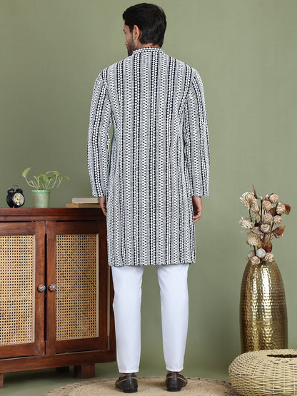 Embroidered And Mirror Work Kurta Pyjama Sets.