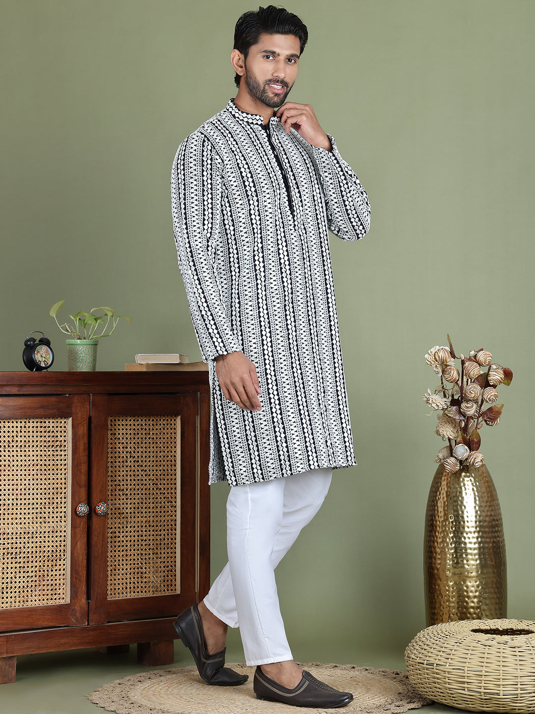 Embroidered And Mirror Work Kurta Pyjama Sets.